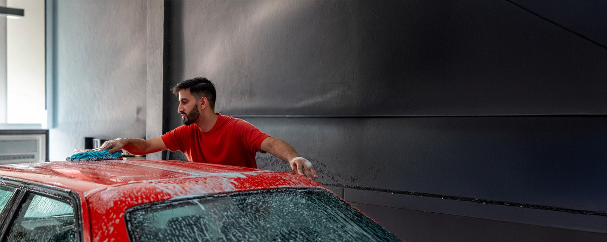 Washing a red car with McKillans gear