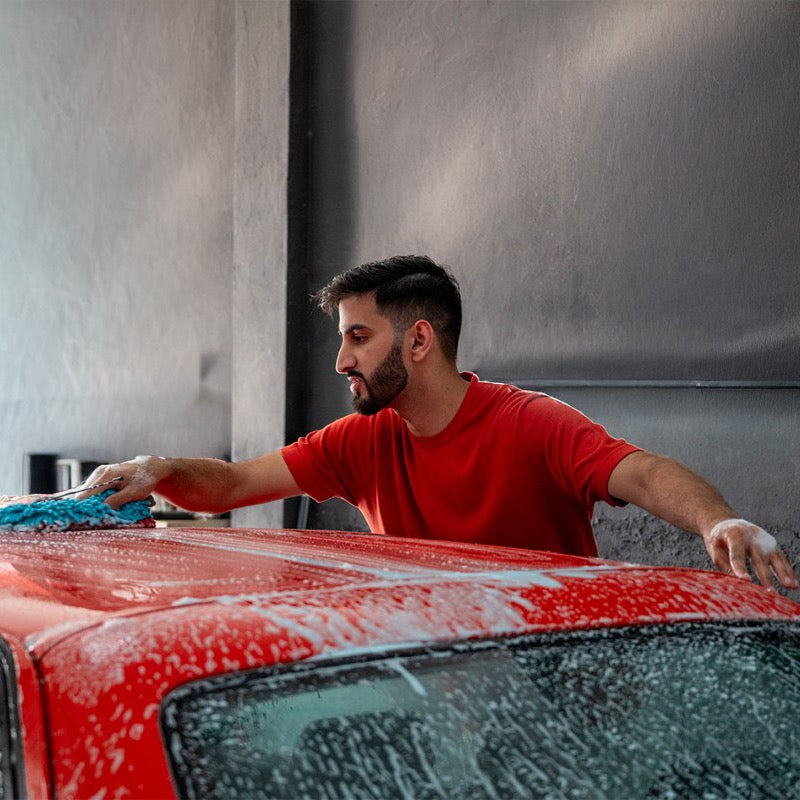 Washing a red car with McKillans gear